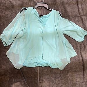 Pale teal quarter sleeve with slits sheer and cotton inside